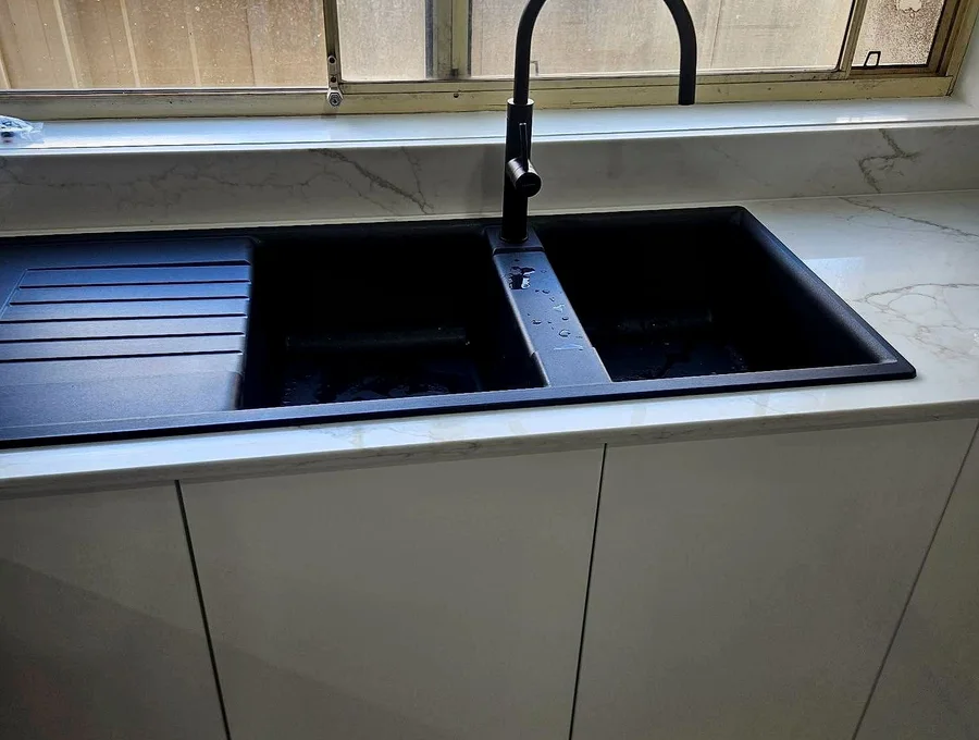 Kitchen sink and tapware installed by RHINO